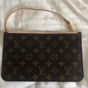 Gently used Louis Vuitton Wristlet - No odors, stains or other blemishes.